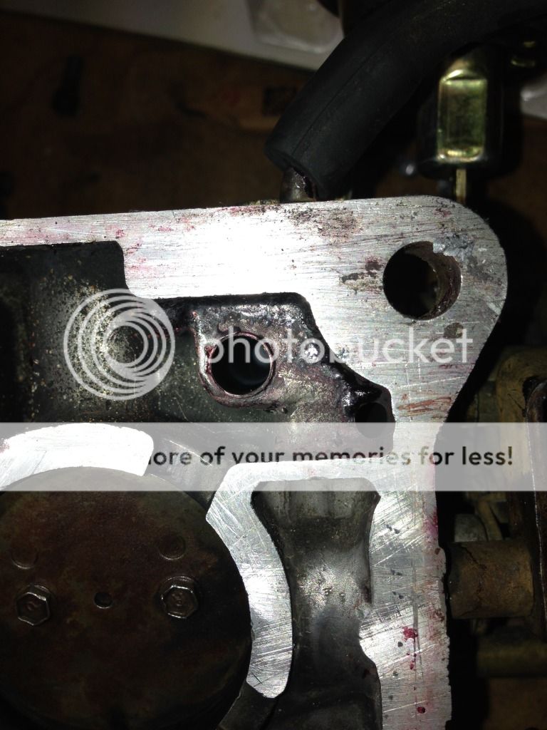 What's with this hole in my carburetor? The Forums